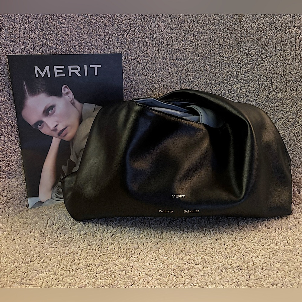 Merit x Proenza Schouler reversible twist tie makeup bag.